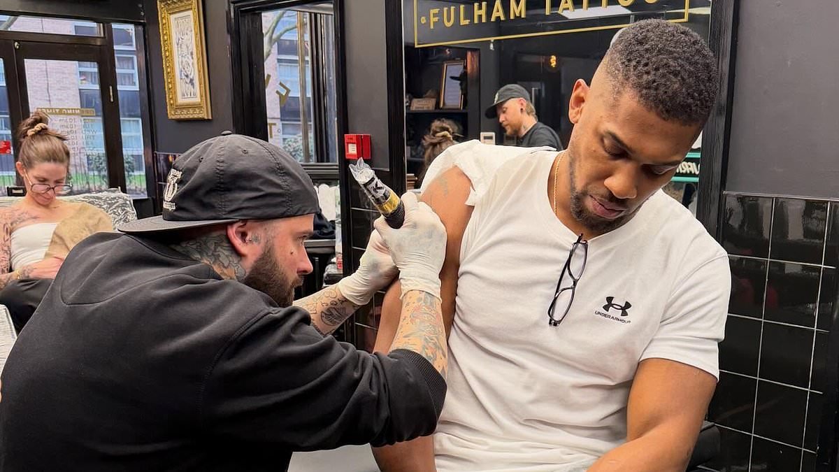 Anthony Joshua gets touching tattoo tribute to his two close friends killed in Nigeria car crash